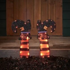Lot De Décorations D'Halloween Extérieur -Light4fun Boutique HA23008 jambes de sorciere piquets de jardin a piles pour halloween df963477 1d17 4bda 9e60 d6eb6cac9026