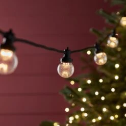 Guirlande Guinguette Pro Connect IP67 De 25m 50 LED Blanc Chaud Câble Noir Raccordable Ampoules Transparentes