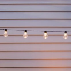 Guirlande Guinguette Solaire Carnaval 20 Ampoules 5 Guirlande Guinguette Solaire Carnaval 20 Ampoules -Light4fun Boutique SL17001 guirlande guinguette solaire blanc chaud dans jardin Close P2