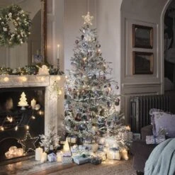 10 Clips Bougies De Noël TruGlow® Argentées Avec Télécommande 9 10 Clips Bougies De Noël TruGlow® Argentées Avec Télécommande -Light4fun Boutique sapin de noel enneige violet prune pour salon